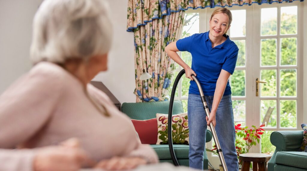 Female Home Help Cleaning House With Vacuum